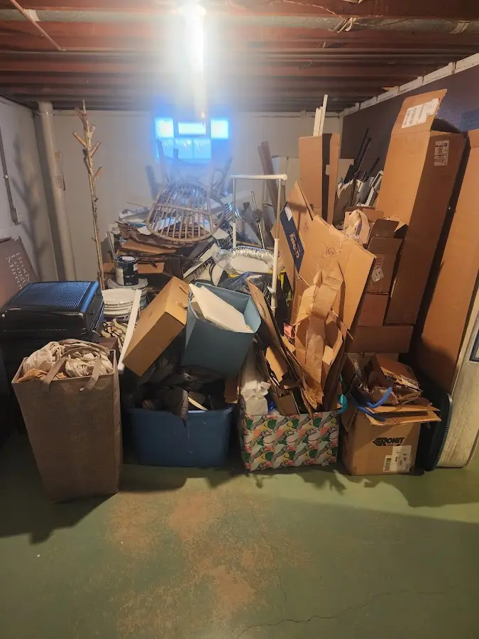 Roll-off dumpster container at job site for Construction Dumpster Rental in Woodland Park